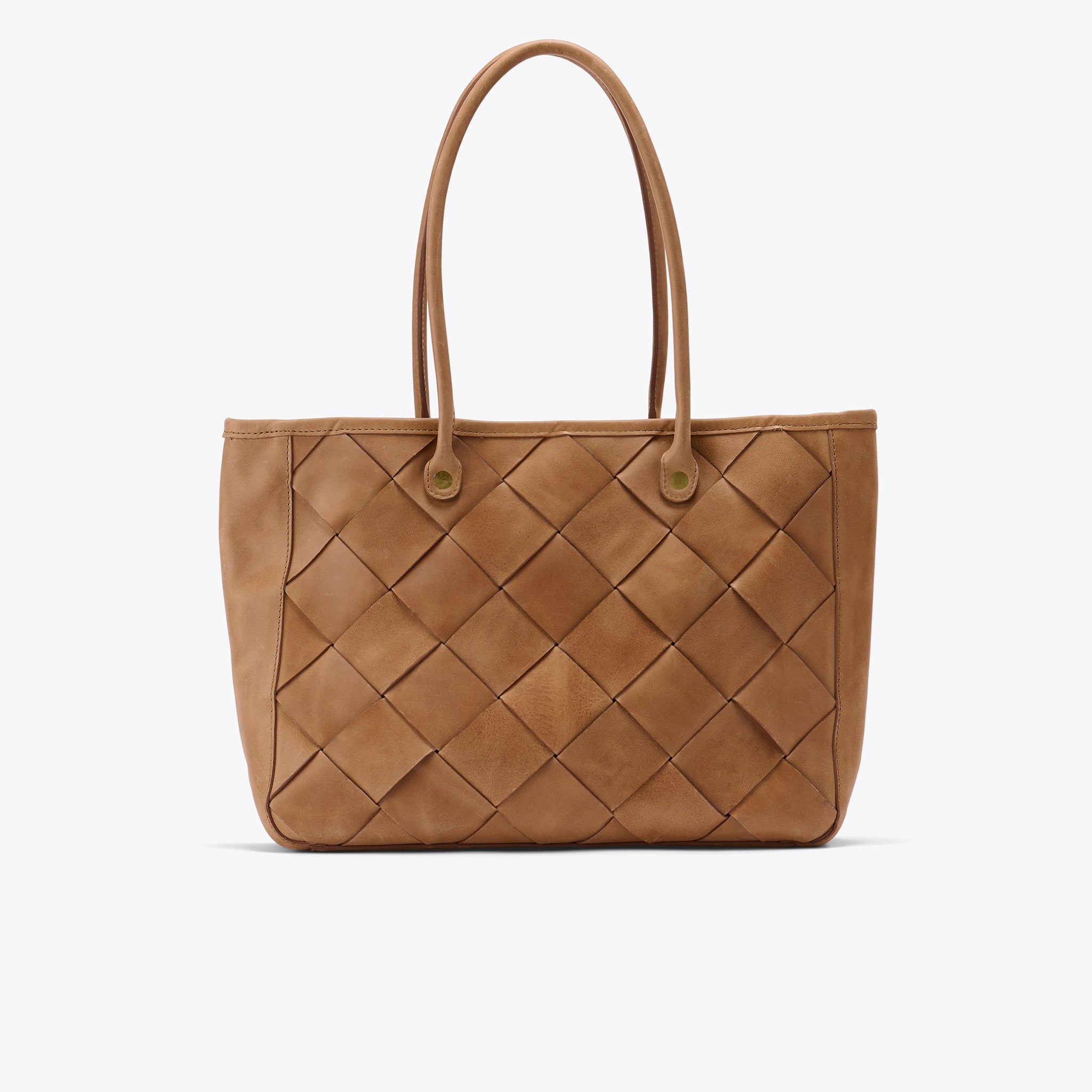 The Leila tote is the perfect on-the-go bag. With its neutral